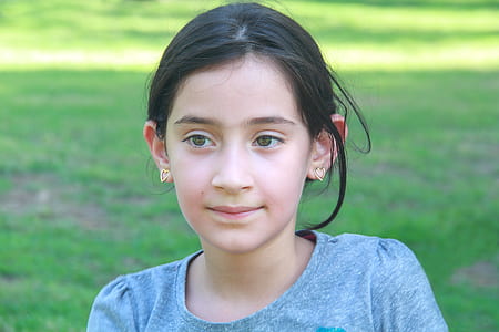girl's blue crew-neck shirt thumbnail