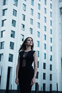 woman wearing black sleeveless dress thumbnail