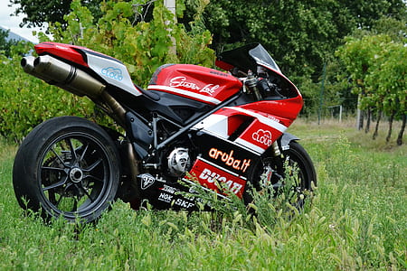 black and red sports bike thumbnail