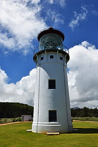 white lighthouse on hill thumbnail