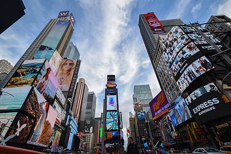 New York Time Square during daytime with LED monitors turned on thumbnail