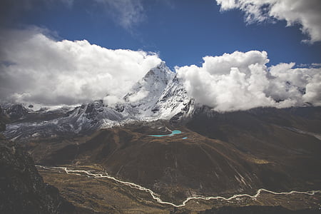 aerial photo of volcano covered with snow during daytime thumbnail