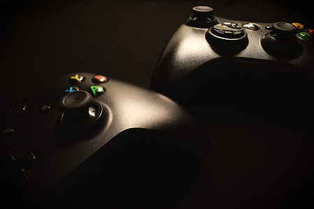 two Xbox 360 controllers thumbnail
