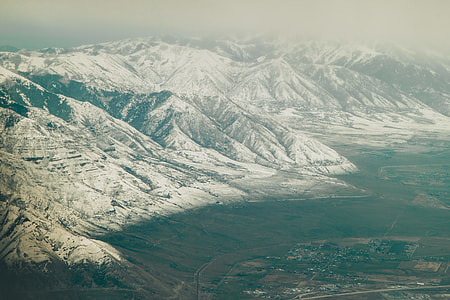 white mountain near city thumbnail