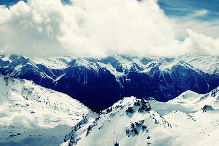 Winter time scene of the snow covered mountains at Val Thorens in the French Alps, the highest ski resort in Europe thumbnail