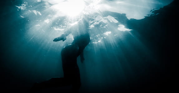 photography of person underwater thumbnail