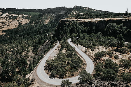 aerial photo of U-shaped road during daytime thumbnail