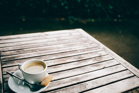 Cup of coffee on a table thumbnail