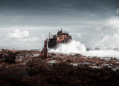 ship near rock cliff digital wallpaper thumbnail