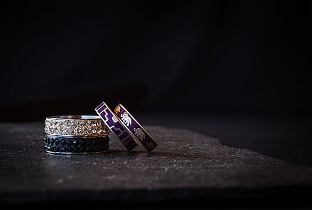 four assorted-color tungsten rings thumbnail