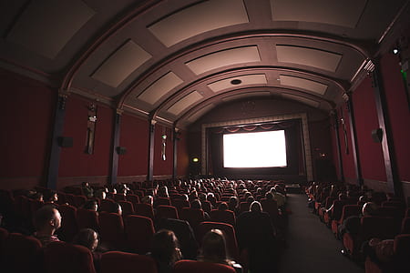 people sitting on chairs watching movie thumbnail