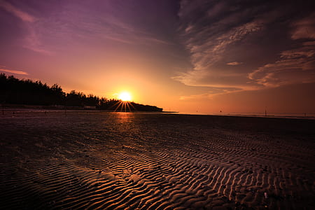 landscape photography of seashore at golden hours thumbnail