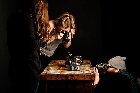 People Taking Pictures of Vintage Cameras thumbnail