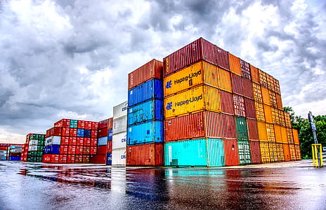 container van lot under cloudy sky thumbnail