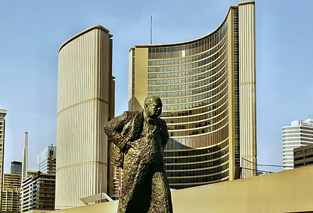 man statue during daytime thumbnail
