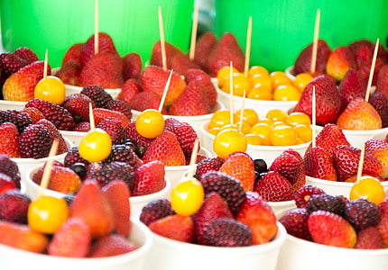 red strawberries in white ceramic cups thumbnail