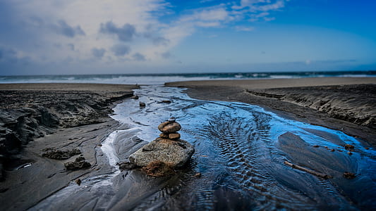 rock formation near shore thumbnail