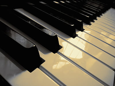 white and black electric keyboard thumbnail