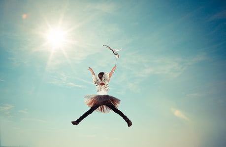 jump shot of person wearing tutu dress thumbnail