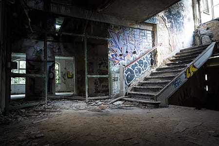 Graffiti Painted on Wall in Abandoned Building thumbnail