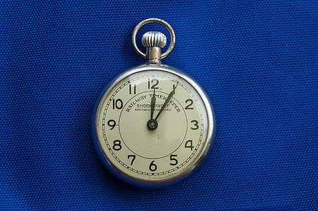round silver-colored analog pocket watch thumbnail