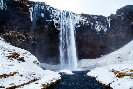 landscape photography of water falls during daytime thumbnail