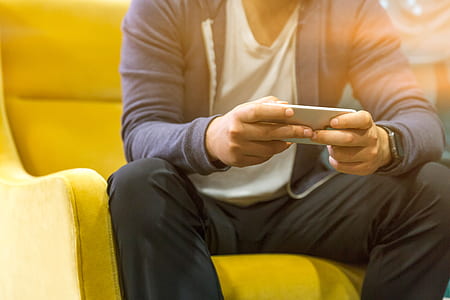 man sitting on couch thumbnail