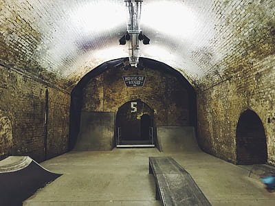 empty black skate park tunnel with ramps thumbnail