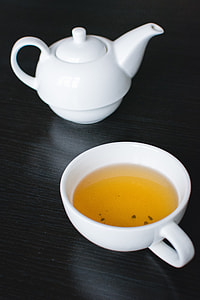 Afternoon black tea in a white teapot thumbnail