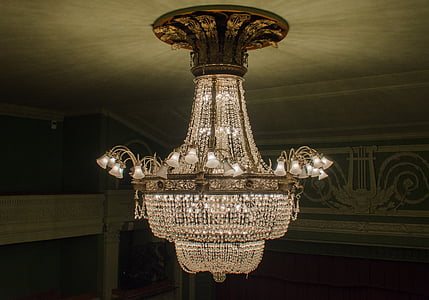 turned on clear glass chandelier thumbnail