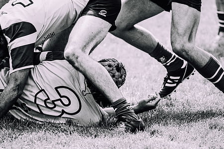grayscale photo of people playing soccer thumbnail