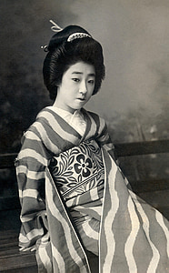grayscale photography of woman sitting thumbnail