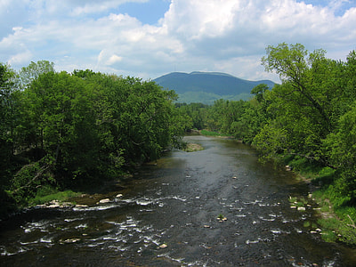 Mount Ascutney Landscape with clouds and River in Claremont, New Hampshire thumbnail
