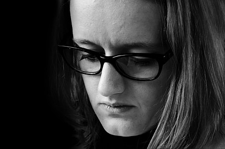 grayscale photo of woman wearing black sunglasses thumbnail