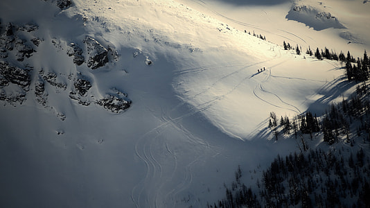 aerial photography of snow capped mountain during daytime thumbnail