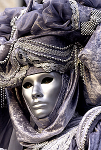 person wearing gray mask thumbnail
