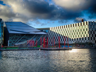 city building across body of water thumbnail