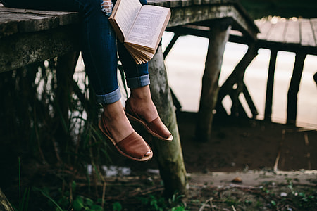 Reading book at lake thumbnail