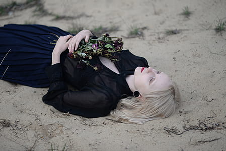 Woman Lying on Sand thumbnail