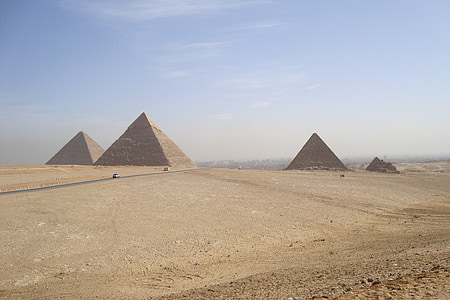 three pyramids in the middle of desert thumbnail