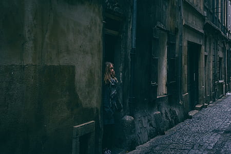 woman standing on doorway thumbnail