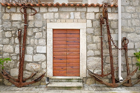 brown anchor near brown wooden door thumbnail