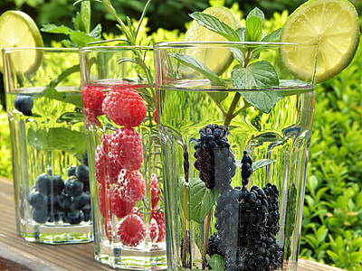 clear drinking glasses filled with fruits thumbnail