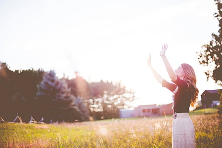 woman raising her hands thumbnail