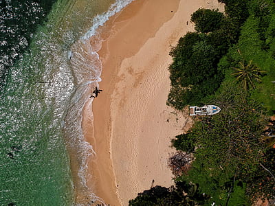 bird's-eye view photography of seashore and sea thumbnail