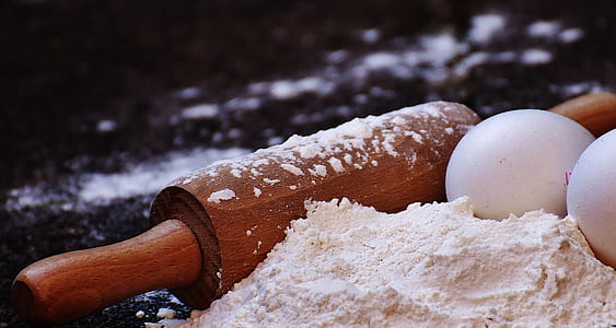 rolling pin with two eggs and flour thumbnail