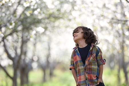 Boy Looking Up Posing for Photo Shoot thumbnail