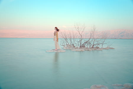 woman between body of water illustration thumbnail