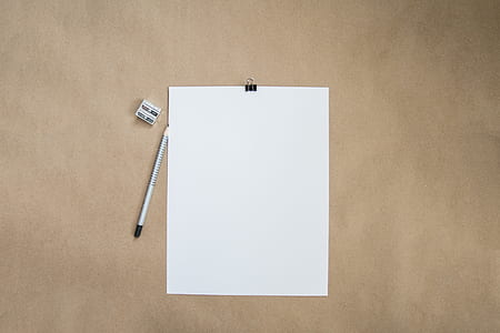 white printer paper beside gray pencil and eraser thumbnail
