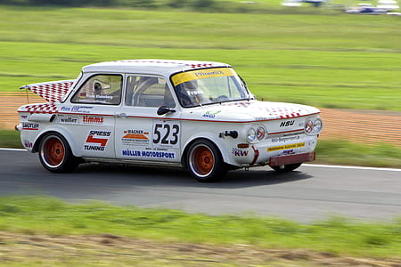 time lapse photography of white racing car thumbnail